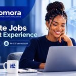 Lady with curly hair searching on her PC fo remote jobs with no experience, cedit6 card or bank account